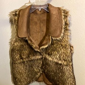 Brown 2 tone faux fur vest. Reversible suede. Wear either way